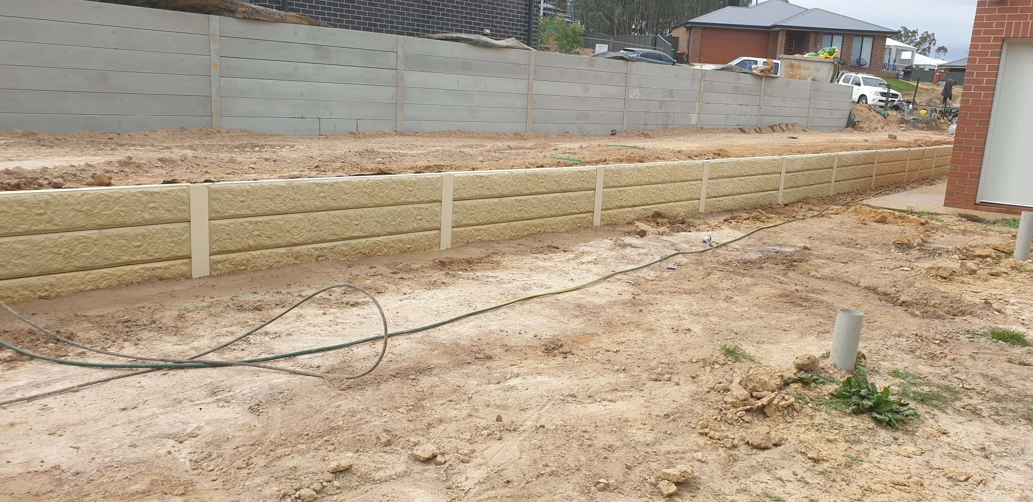 Tiered concrete sleeper retaining walls built by A1 Retaining in the Albury Wodonga region